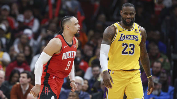 Jan 29, 2024; Houston, Texas, USA; Houston Rockets forward Dillon Brooks (9) reacts toward Los Angeles Lakers forward LeBron James (23) after scoring a basket during the fourth quarter at Toyota Center. Mandatory Credit: Troy Taormina-USA TODAY Sports